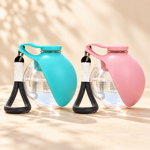 Colores disponibles del bebedero portátil: turquesa y rosa.